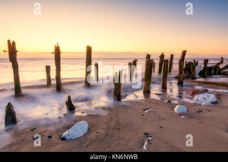 Old eroded sea defences at the Yorkshire nature reserve of Spurn point Stock Photo