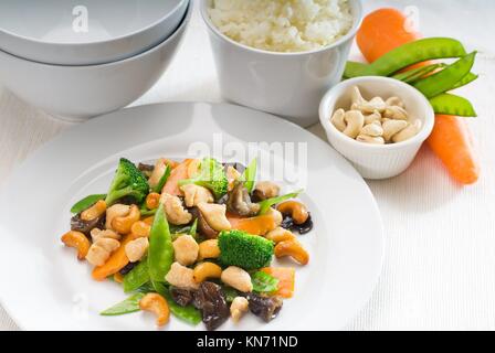 fresh chicken and vegetables stir fried with cashew nuts,typical chinese dish.