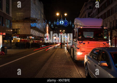 LONDON, UK - DECEMBER 09, 2017: Christmas street decorations on The Strand - a major thoroughfare in the City of Westminster and the main link between Stock Photo