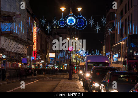 LONDON, UK - DECEMBER 09, 2017: Christmas street decorations on The Strand - a major thoroughfare in the City of Westminster and the main link between Stock Photo