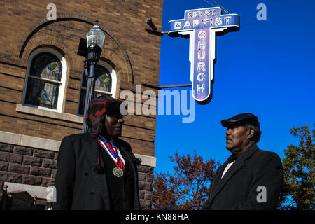 Birminham, Alabama, USA. 10th Dec, 2017. Two members of the historic 16th Street Baptist Church in Birmingham, Alabama''”which was bombed by the KKK in 1963, killing four black girls''”debate the two candidates for U.S. Senate on Sunday. Mr. Casey, (left), said he supports the Republican platform of Roy Moore, while the other member who declined to give his name, said he is support the Democrat Doug Jones, who prosecuted one of the bombers in the infamous civil rights era case. Credit: Miguel Juarez Lugo/ZUMA Wire/Alamy Live News Stock Photo