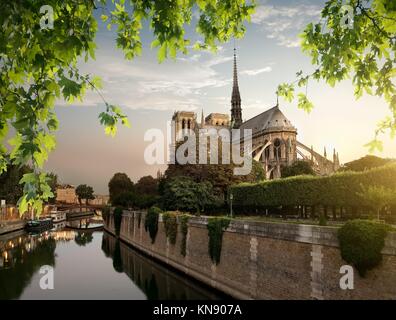 Notre Dame and park on river Seine in Paris, France.