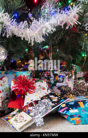 Christmas presents under the Christmas tree Stock Photo