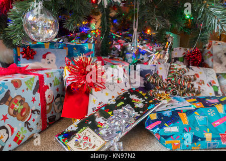 Christmas presents under a Christmas Tree Stock Photo