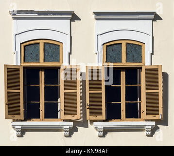 Wooden shutters on windows on building in Spain Stock Photo
