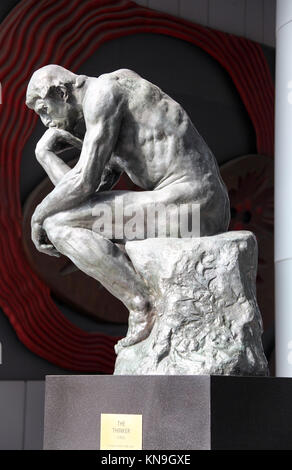 The Thinker by Auguste Rodin at the OUE Bayfront Office Complex in Singapore Stock Photo