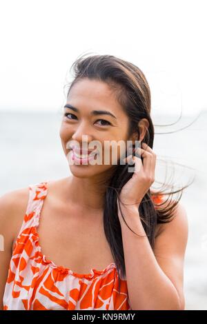 A young Hawaiian girl wearing a flower lei, Maui, Hawaii Stock Photo ...