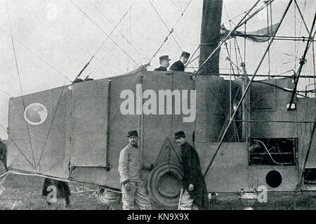 The caption for this photo that dates to between 1914 and 1917 (time of the First World War) reads: Armored car of a dirigible balloon. Showing the relative size of the car, which will accommodate more than a dozen men. It is armed with machine guns and bomb-droping devices. Stock Photo