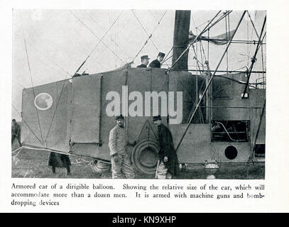 The caption for this photo that dates to between 1914 and 1917 (time of the First World War) reads: Armored car of a dirigible balloon. Showing the relative size of the car, which will accommodate more than a dozen men. It is armed with machine guns and bomb-droping devices. Stock Photo