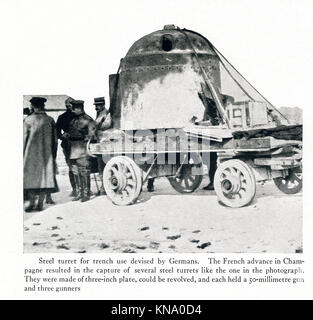 The caption for this photo that dates to between 1914 and 1917 (time of the First World War) reads:  Steel turret for trench use devised by Germans. The French advance in Champagne resulted in the capture of several steel turrets like the one in this photograph. They were made of three-inch plate, could be revolved, and each held a 50-millimetre gun and three gunmen. Stock Photo