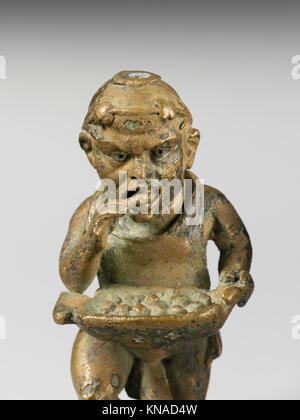 Bronze statuette of a dwarf with silver eyes MET DP246399 Bronze statuette of a dwarf with silver eyes MET DP246399 /246687 Stock Photo