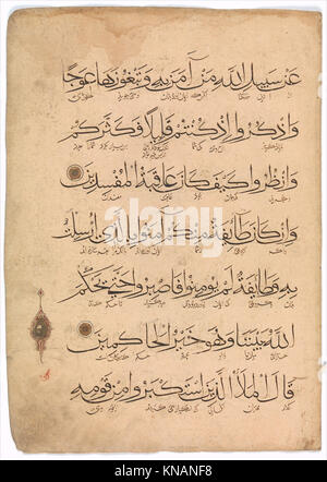This folio from a Qur'an manuscript contains Arabic script on paper and ...