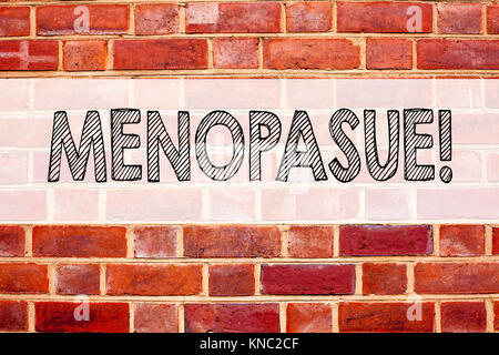 Conceptual announcement text caption inspiration showing Menopause. Business concept for Midlife Crisis Grand Climacteric written on old brick backgro Stock Photo