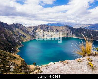 Turquoise waters of Quilotoa lagoon, volcanic crater lake in Ecuador Stock Photo