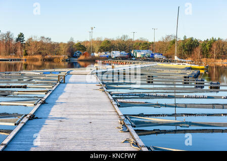 Nattraby, Sweden - November 13, 2017: Documentary of everyday life and environment. The boat club marina as seen from the outer end, on a cold and fro Stock Photo