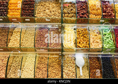Market stall with various dried fruits and nuts Stock Photo