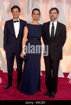 HOLLYWOOD, CA - FEBRUARY 22:  Bennett Miller, Maya Rudolph and Paul Thomas Anderson attendst the 87th Annual Academy Awards at Hollywood & Highland Center on February 22, 2015 in Hollywood, California.   People:  Bennett Miller, Maya Rudolph and Paul Thomas Anderson Stock Photo