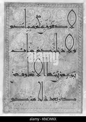 This folio from a Qur'an manuscript features Arabic calligraphy ...
