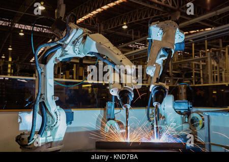 Robot welding is test welding  in factory Stock Photo