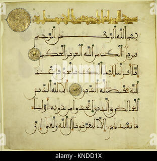 A Qur'an manuscript folio with detailed Arabic calligraphy and ...