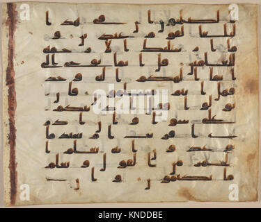 This folio from a Qur'an manuscript displays Islamic calligraphy ...