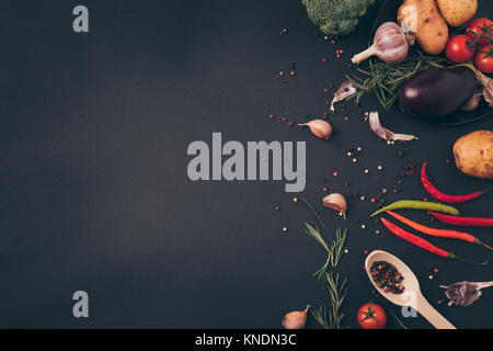top view of spices and vegetables on gray surface Stock Photo