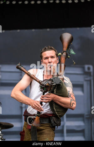 The German power metal band In Extremo performs a live concert at the Swiss music festival Greenfield Festival 2015 in Interlaken. Here musician Marco Ernst-Felix Zorzytzky is seen live on stage. Switzerland, 12/06 2015. Stock Photo