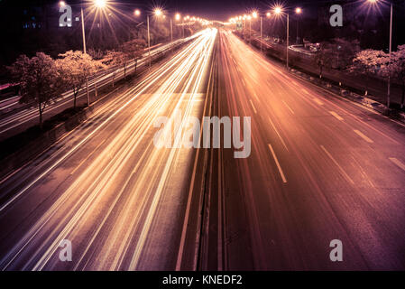 traffic light trails at Night in Suzhou, China. Stock Photo