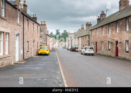 Glamis,Scotland,UK-December 06,2017: The village buildings in the village of Glamis looking down the Main Street towards the small square. Stock Photo