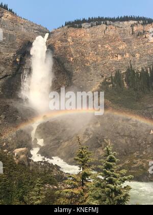 Rainbow over Takakkaw Falls, Yoho National Park, British Columbia, Canada Stock Photo