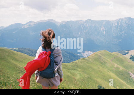 Woman hiking in the mountains, Azuga, Romania Stock Photo
