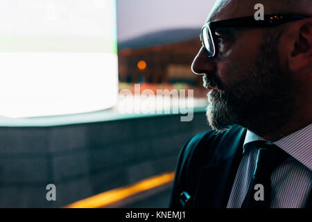 Mature businessman outdoors, profile Stock Photo