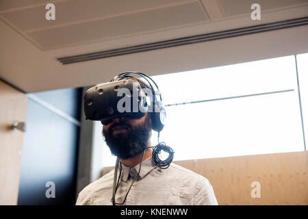 Man wearing virtual reality headset Stock Photo