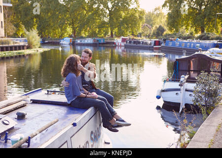 Couple on canal boat Stock Photo
