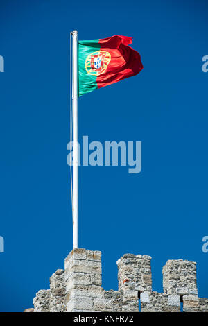 National Portuguese flag flying over St George Castle, Lisbon, Portugal, Europe. Stock Photo