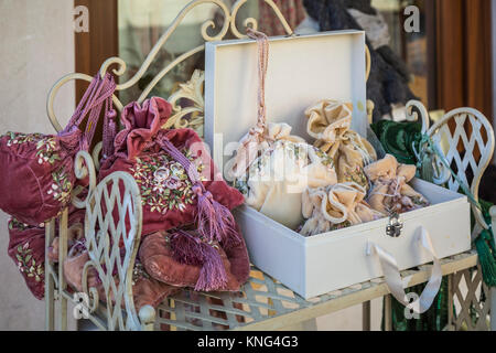 A lace shop display in the Venetian village of Burano, Venice, Italy, Europe. Stock Photo