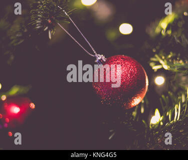 Red Christmas Bauble - Christmas Decoration on tree Stock Photo