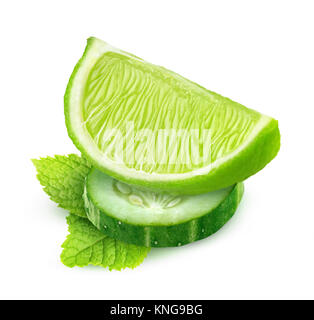 Isolated slices of cucumber and lime, and mint leaf (cocktails component) isolated on white background, with clipping path Stock Photo