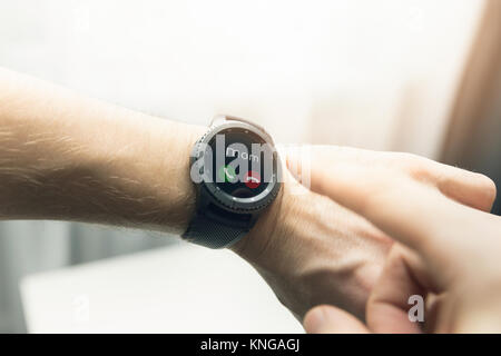 man using smart watch to receive a call Stock Photo