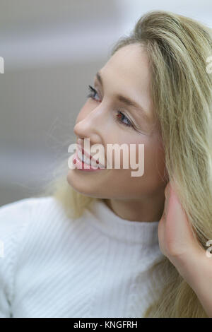 Soft focus profile portrait of girl listening attentively Stock Photo