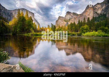 Reflection of El Capitan and Yosemite Fall on stream water from Yosemite Valley View, Yosemite National Park. Stock Photo