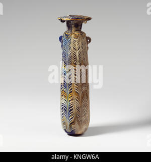 Glass alabastron (perfume bottle) MET DP153452 253084 Eastern Mediterranean or South Italian, Glass alabastron (perfume bottle), late 4th?early 3rd century B.C., Glass, H.: 6 15/16 in. (17.6 cm). The Metropolitan Museum of Art, New York. Bequest of Theodore M. Davis, 1915 (30.115.34) Stock Photo