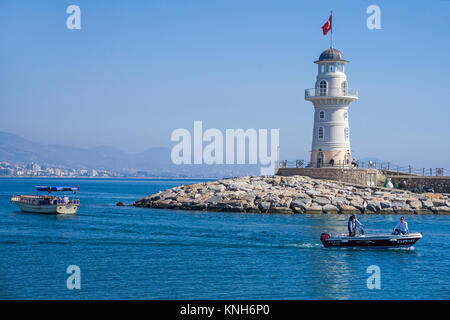 Lighthouse at the harbour access, Alanya, turkish riviera, Turkey Stock Photo