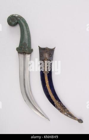 Dagger (Jambiya) with Sheath and Carrier. Date: 18th century; Culture: Indian, Mughal; Medium: Steel, silver, jade, leather, wood, lacquer, velvet;