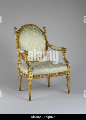 Armchair (Fauteuil à la reine) MET DP160901 189386 Maker: attributed to Georges Jacob, French, 1739?1814, Armchair (Fauteuil ? la reine), ca. 1785, Carved and gilded beech; silk upholstery (not original), H. 38-3/4 x W. 26-3/8 x D. 23-5/8 in.  (98.4 x 67.0 x 60.0 cm). The Metropolitan Museum of Art, New York. Gift of J. Pierpont Morgan, 1906 (07.225.106) Stock Photo
