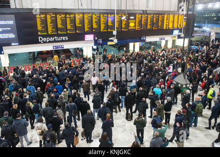 Waterloo Station, London, United Kingdom.  11th December 2017. A line side fire has affected a number of lines outside London Waterloo, some track circuits have come into contact with a 650 volt cable and exacerbated the problem.  Disruption is expected to continue until the end of service.  Trains have been cancelled on some routes and services on others have been reduced. Michael Tubi/ Alamy Live News Stock Photo