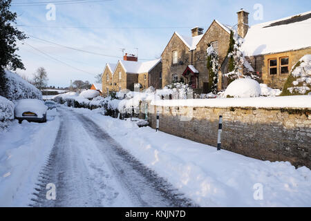 Titley, Herefordshire, UK - December 2017 - Overnight temperatures dropped to minus 9c ( -9c ) in the rural parts of Herefordshire last night including Titley village - the side roads of the village remain frozen over with ice and snow. Credit: Steven May/Alamy Live News Stock Photo