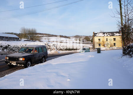 Titley, Herefordshire, UK - December 2017 - Overnight temperatures dropped to minus 9c ( -9c ) in the rural parts of Herefordshire last night including Titley village - early morning motorists drive with care on the frozen roads through the village. Credit: Steven May/Alamy Live News Stock Photo