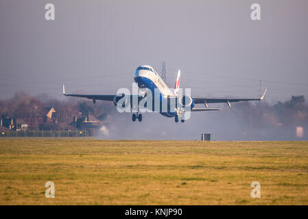 Aircraft departed London Southend Airport in freezing conditions, including a British Airways Embraer ERJ-190 which had diverted in from London City airport Stock Photo