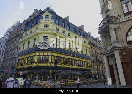 Brussels, Belgium. 24th June, 2017. 'Drug Opera' is written on the yellow facade of the corner building on Rue Grétry 51 which houses a restaurant of that name, pictured on 23.06.2017 in the Belgian capital Brussels. The name 'Drug Opera' points to the fact that the historic building once housed a pharmacy. - NO WIRE SERVICE - Credit: Sascha Steinach/dpa-Zentralbild/dpa | usage worldwide/dpa/Alamy Live News Stock Photo